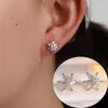 Pendientes de botón de estrella de seis puntas incrustados con circonita de lujo ligero Pendientes de copo de nieve exquisitos y de moda Pendientes florales exquisitos de nicho pequeño Versátiles para el trabajo