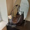 Bolsa de ombro e transversal grande e estilosa, estilo bolinho, simples, de alta costura, para uso transfronteiriço, novidade outono 2026