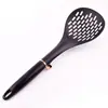 Venta al por mayor de fábrica juego de utensilios de cocina de ocho piezas diseño de agujero para colgar almacenamiento soporte creativo espátula antiadherente juego de ocho piezas