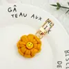 Nuevo llavero de girasol tejido a mano de lana, llavero de moda lindo para bolso, colgante para coche