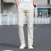 Pantalones Casuales Elásticos Transpirables para Hombres Jóvenes 2026 Nuevo Primavera y Verano Algodón Puro Negocio Ajustados Rectos Pantalones Largos para Hombre