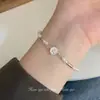Estilo francés lujo ligero simple Pulsera de imitación de perla Tulipán costura versátil nuevo diseño de alta calidad exquisita pulsera para mujer