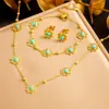 Moda transfronteiriça nicho antigo azul turquesa acessórios flor banhado a ouro corrente aço inoxidável colar brincos pulseira terno