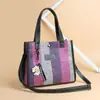 Bolso de mujer nuevo 2024 bolso de hombro de moda bolso cruzado bolso de lona bolso de mano de color contrastante bolso tote simple combinable