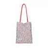 Bolsa de lunares de nicho súper popular estilo coreano para mujer 2026 Nueva bolsa versátil de un solo hombro para llevar debajo del brazo Bolsa pequeña de mano para salir a trabajar