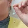 Pendientes Versátiles Estilo Coreano y Japonés Ab Planet con Borlas para Mujer Pendientes de Botón de Diseño de Moda Nicho Pendientes Nuevos 2025