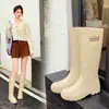 Exportación transfronteriza de botas de lluvia de caña alta, zapatos de agua de alta gama estilo coreano, botas de goma impermeables y antideslizantes de moda para mujer