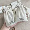 Bolsa de armazenamento com cordão de linho natural personalizada em bege vintage para lojas de joias transfronteiriças, pequena bolsa de tecido para embalagem de joias
