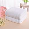Toalla de baño de algodón para hotel, espesada, aumentada, suave, absorbente, de algodón, para hotel, salón de belleza, blanca, al por mayor