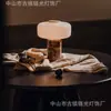 Lámpara de mesa de mármol de lujo ligero de alta gama Bulgari, modelo de diseñador para sala de estar y dormitorio, lámpara de mesa pequeña recargable, artística y conveniente