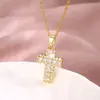 Exquisito colgante de cruz de circonita de diamante todo a juego collar de acero de titanio transfronterizo europeo y americano Hip Hop Hip Hop hombres y mujeres