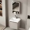 Gabinete de banheiro integrado com armário para pia, pia de cerâmica e design de parede para uma configuração completa de banheiro