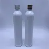 Suministro directo de fábrica 180ml plástico transparente hombro redondo tapa de aluminio tapa metálica botella rocío puro empaque pequeño botella vacía PET