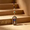 Joia de liga metálica estilo étnico chinês, pingente decorativo de vajra oval giratório, lembrança de viagem atacado