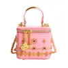 Bolsa mini personalizada para labiales transfronteriza 2026, nueva bolsa cruzada tachonada primavera/verano, bolso de hombro versátil y de moda para mujer
