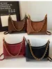 Bolso de Axila Personalizado para Mujer 2026 Nuevo Bolso de Hombro de Gamuza Otoño Vintage Bolso Cruzado Tipo Cubo para el Trabajo