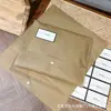 Bolsas de Embalaje de Tela No Tejida Ecológica Color Azul Neblina, Bolsas de Embalaje Interior a Prueba de Polvo para Ropa, Bolsas de Embalaje Tipo Sobre con Logo Personalizado en Stock