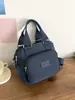 Venta al por mayor de bolsos nuevos para mujer, tendencia transfronteriza, bolso de mano, bolso de hombro, bolso cruzado, mochila multipropósito, mochila casual de moda con múltiples compartimentos
