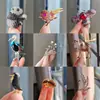 Nuevo broche de aleación para mujer, moderno y de alta gama, pin de lujo nicho para abrigos y trajes, simple y elegante, broche versátil