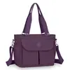 Bolso de mujer tendencia transfronteriza, bolso de hombro para mamá, nuevo modelo 2026, tela de nailon ligera, bolso de tela de color liso, bolso de mano cruzado