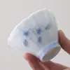 Taza de té de cerámica azul con loto pintado a mano con color de engobe para el hogar taza para degustación de té pu'er juego de té kung fu taza de maestro taza individual