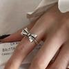 Anillo de flor hueca de plata de ley 925 para mujer, moderno y distintivo, con lazo, estilo sencillo y abierto.