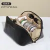Nova Bolsa de Maquiagem de PU Estilosa, Bolsa Almofada de Alta Qualidade e Grande Capacidade, Bolsa de Armazenamento para Viagem, Bolsa de Armazenamento Portátil de Mão Atacado