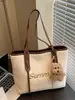 Bolso de Paja Tejida para Vacaciones en la Playa para Mujeres 2025 Nuevo Popular de Gran Capacidad Bolso de Hombro Moderno Bolso Tote de Moda para el Trabajo