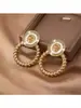 1 par de pendientes de moda europea y americana con cabeza de león y corona de cáñamo de estilo retro, pendientes de temperamento francés estilo corte al por mayor