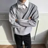 Suéter tipo polo de punto de alta gama con cuello en V, diseño de dos piezas falsas para hombre, diseño de otoño e invierno, tejido elegante para parejas