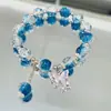 Arcoíris de verano ~ pulsera de nicho de color pequeño y fresco dopamina pulsera elástica de alta gama para mujer de verano al por mayor