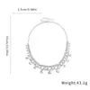 Aretes y collar con colgante de flor en forma de corazón incrustado de diamantes, estilo minimalista único, cadena elegante para la clavícula, joyería de lujo ligero de alta gama para mujer