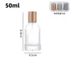 Al por mayor en stock 30/50/100ml botellas de perfume de vidrio transparente con spray de presión, botellas dispensadoras cosméticas portátiles