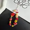 Cadena para teléfono estilo Ins con estrellas rojas, cordón para funda de teléfono de rugby, accesorio de cadena para cámara con cuentas DIY