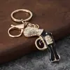 Lujo Artesanal Regalo Pequeño Creativo Revólver Exquisito Pistola Diseño de Pedrería Llavero Colgante para Bolsos