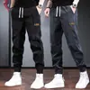 Pantalones de chándal de pana para hombre para otoño, pantalones casuales de retazos, corte holgado moderno, pantalones jogger versátiles, modernos