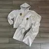 Marca Europeia e Americana Transfronteiriça Tendência Outono e Inverno Moletom com Capuz e Zíper Estampado e Conjunto de Calças Moda High Street Casual Esportivo