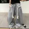 Diseño europeo y americano con costuras de cuerda gruesa, estilo callejero deportivo americano, pantalones de chándal de pierna ancha curvados holgados de invierno engrosados