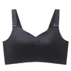 Comercio exterior al por mayor ropa interior talla grande para mujer pecho grande pequeño sin costuras fino fruncido accesorio leche anti-caída sujetador ajustable