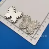 Galvanizado Oso Artificial Pajarita Copo de Nieve Corona Flor Plástico Accesorios Diadema DIY Agarrador Funda de Teléfono Celular Hebilla de Zapato Pegatina