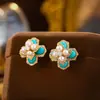 Nuevos Pendientes de Perla Turquesa Azul Estilo Chino Pendientes Estéreo de Flor de Cuatro Hojas Pendientes de Moda Elegantes de Gama Alta de Nicho para Mujer