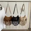 Bolso de axila de gamuza con flecos estilo retro occidental 2026 para mujer con correa de hombro ancha ajustable, bolso tipo silla de montar de gran capacidad, bolso de hombro