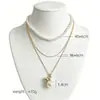 Cadena de Perlas Oceánicas de Venta Caliente Transfronteriza Europea y Americana Cadena para Clavícula de Mujer Colgante de Estrella de Mar y Concha Collar Multicapa Apilable Venta al por Mayor