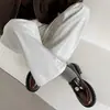 Sapatos Pequenos de Couro Slip-On Versáteis Aumentadores de Altura com Solado Grosso Estilo Britânico Retrô para Mulheres 2025 Novos Loafers com Salto Plataforma Preto