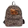 Nova mochila de pelúcia Hello Kitty com estampa de leopardo 2026, estilo coreano, fofa, de grande capacidade, bolsa escolar casual para meninas