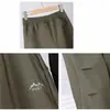 Pantalones de senderismo luminosos de carcasa dura con forro polar, a prueba de viento, impermeables, corte recto ajustado, que alargan las piernas 10530