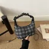 Nuevo Bolso de Mano Plegado a Cuadros 2026 para Mujer con Bordado de Oso Lindo Bolso de Hombro Único Cruzado Bolso de Cadena Versátil de Moda