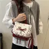 Mochila Nueva de Encaje de Lunares para Mujer 2026 Nueva Moda Tendencia Bolso Cubo con Lazo Mochila Pequeña Versátil