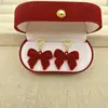 Nuevos Pendientes de Lazo de Terciopelo Rojo Festivo para Mujer Otoño e Invierno, Modernos y Elegantes, Pendientes Dulces en Forma de Corazón, Venta al por Mayor