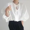 Corea del Sur verano nuevo elegante cuello redondo un botón diseño hueco suelto manga de farol protección solar camisa top